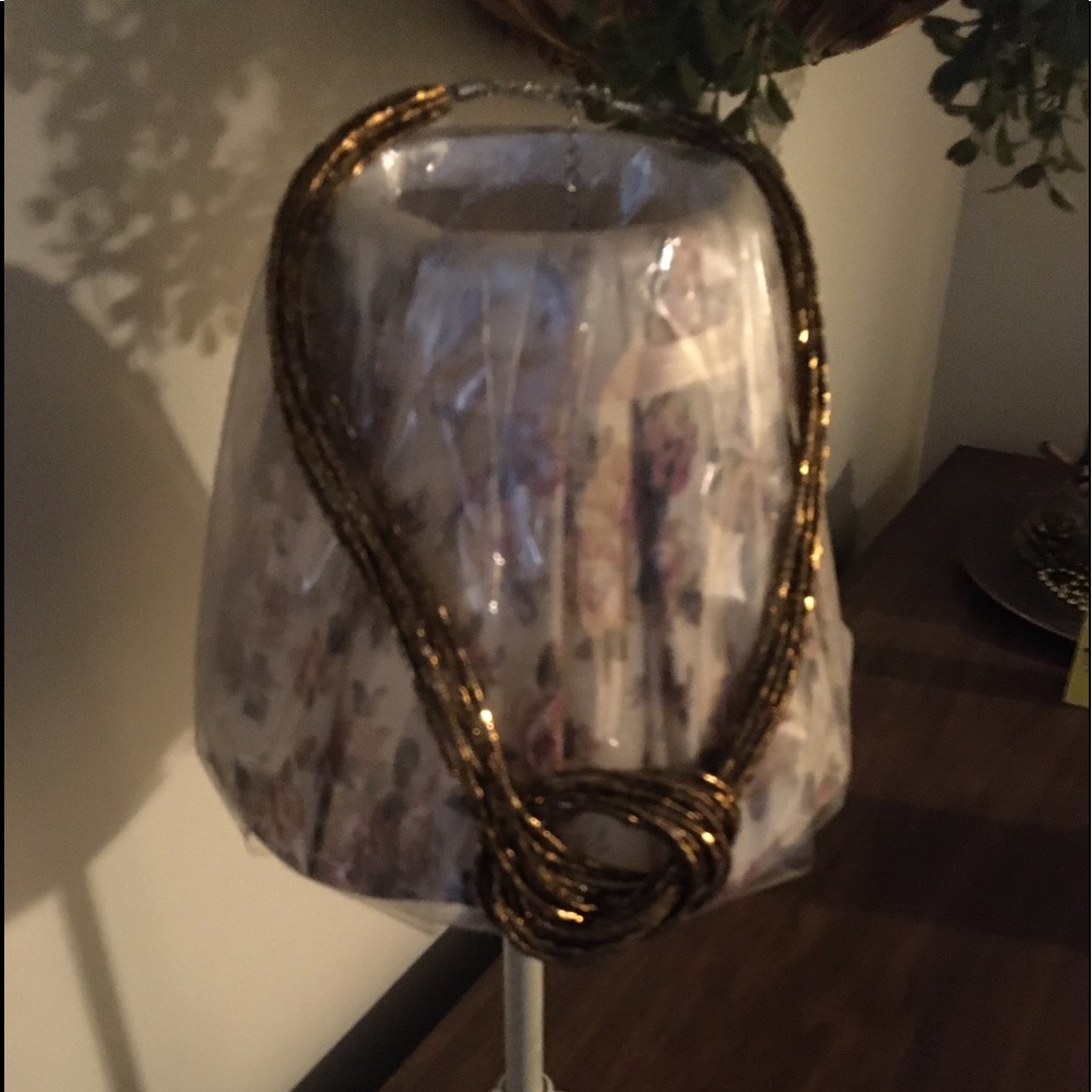 Fashion Brown gold tone necklace.